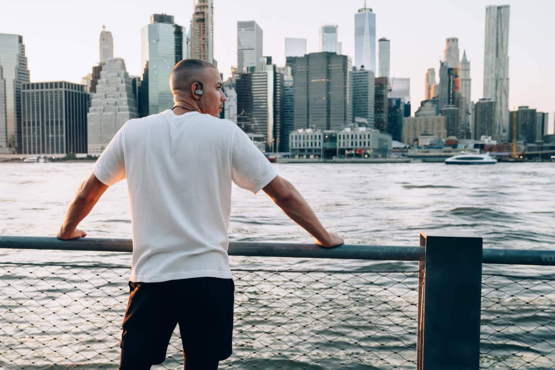 young-man-gay-pride-new-york-city-manhattan-skyline-boy-river-skyline skyline-young-man-gay-pride-new-york-city-manhattan-skyline-boy-river